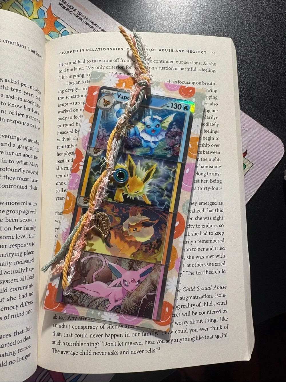 Pokemon Eeveelutions Card Sleeve with Vibrant Orange and Pink Accents